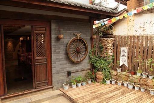 фото отеля Lijiang Qifen Inn