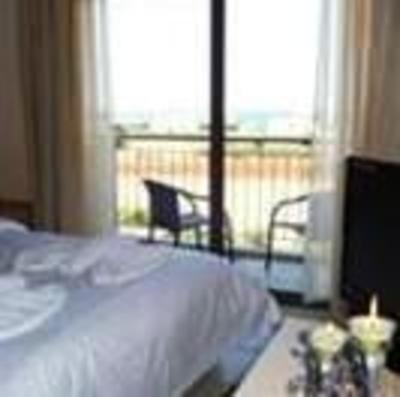 фото отеля Oasis Beach Hotel Anissaras