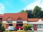 фото отеля Econo Lodge Airport Fletcher