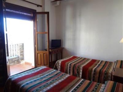 фото отеля Hostal Rural Poqueira