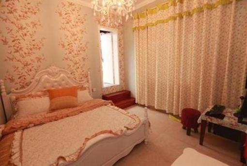 фото отеля Hotel Zhangjiajie Sixiangjia Niaochao Guizu