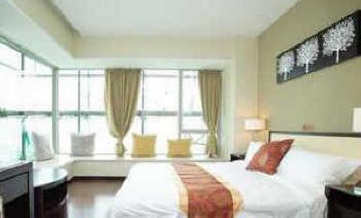 фото отеля She & He Apartment Zhujiang New Offshore
