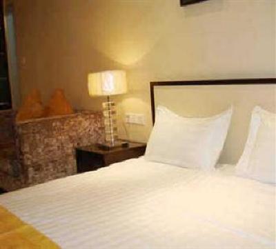 фото отеля She & He Apartment Zhujiang New Offshore