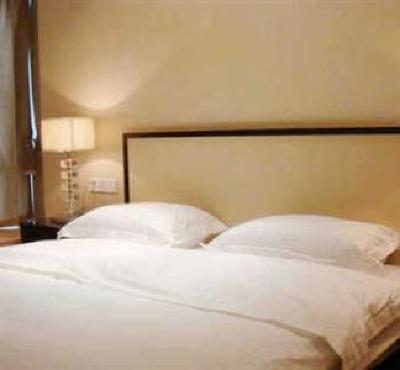 фото отеля She & He Apartment Zhujiang New Offshore