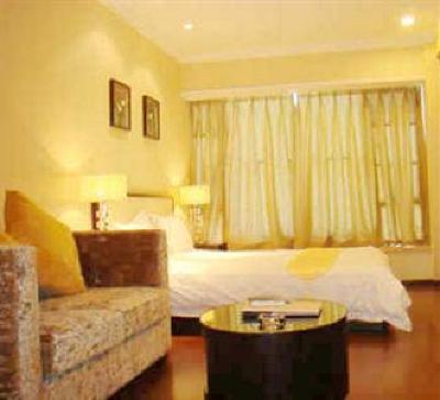 фото отеля She & He Apartment Zhujiang New Offshore