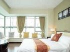 фото отеля She & He Apartment Zhujiang New Offshore