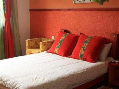 фото отеля Four Eyes Backpackers International Youth Hostel