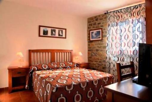 фото отеля Apartamentos Casas Pirineo