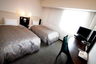 фото отеля Takaoka Manten Hotel Eekimae