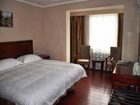 фото отеля Green Tree Inn Yantai Dahaiyang Road