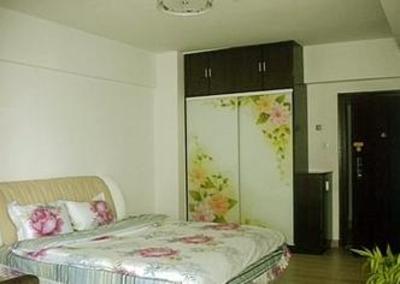 фото отеля Xiaojia Apartment Hotel
