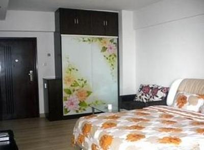 фото отеля Xiaojia Apartment Hotel
