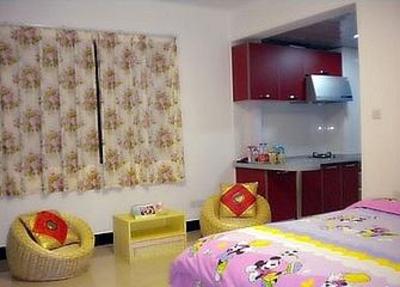 фото отеля Xiaojia Apartment Hotel