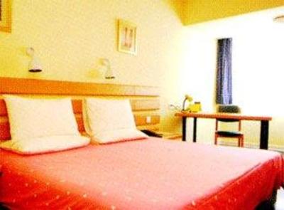 фото отеля Home Inn Zaozhuang Zhenxing Middle Road