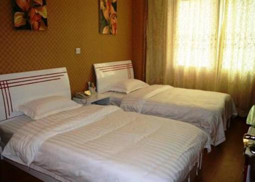 фото отеля Leshan Warm and Harmonious Business Hotel