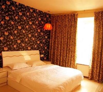 фото отеля Leshan Warm and Harmonious Business Hotel