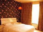 фото отеля Leshan Warm and Harmonious Business Hotel