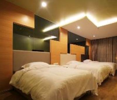 фото отеля Chuangyi Shishang Hotel (Qingdao Lvdao Jiayuan)
