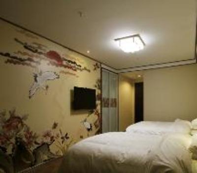 фото отеля Chuangyi Shishang Hotel (Qingdao Lvdao Jiayuan)