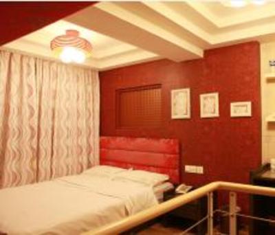фото отеля Chuangyi Shishang Hotel (Qingdao Lvdao Jiayuan)