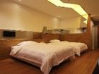 фото отеля Chuangyi Shishang Hotel (Qingdao Lvdao Jiayuan)