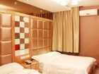 фото отеля Chuangyi Shishang Hotel (Qingdao Lvdao Jiayuan)