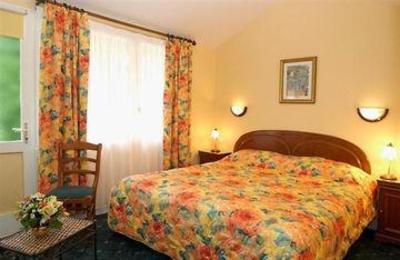 фото отеля Les 13 Assiettes Hotel