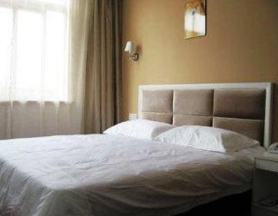 фото отеля Jiangdong Yihao Business Hotel