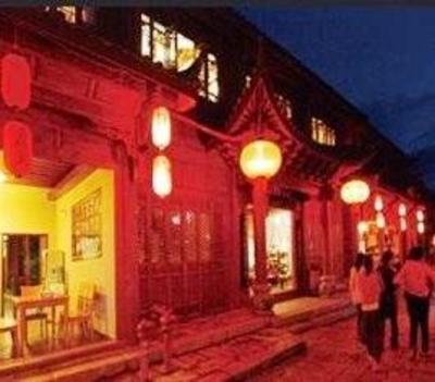 фото отеля Lijiang Timber Rock Inn