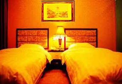 фото отеля Guoshi Business Hotel