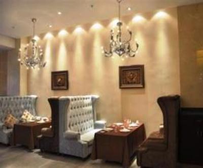 фото отеля Qingdao Shangcheng Elite Holiday Hotel