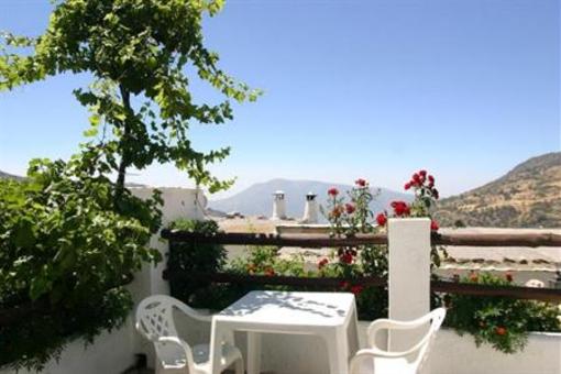 фото отеля Apartamentos Turisticos Las Chimeneas