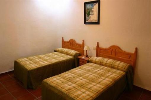 фото отеля Apartamentos Turisticos Las Chimeneas