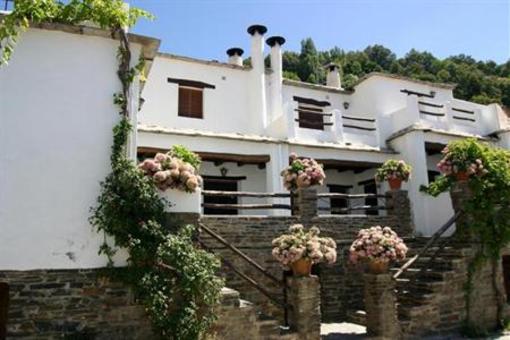 фото отеля Apartamentos Turisticos Las Chimeneas