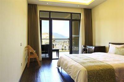 фото отеля Sanya Tujia Vacation Rentals Weisideng