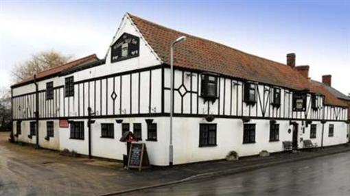 фото отеля The Wishing Well Inn Bourne (England)
