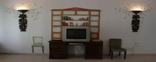 фото отеля Apartamentos La Casa Pintada Caceres