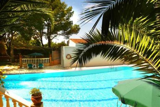 фото отеля Hostal Entre Pinos
