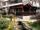 фото отеля Conifer Li Shui Yang Guang Hotel Lijiang