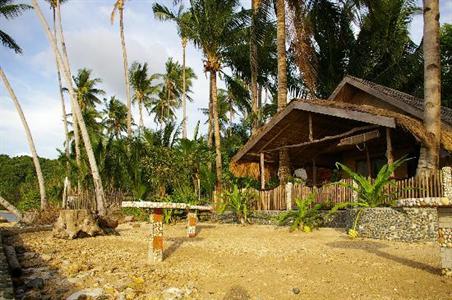 фото отеля Golden Monkey Cottages