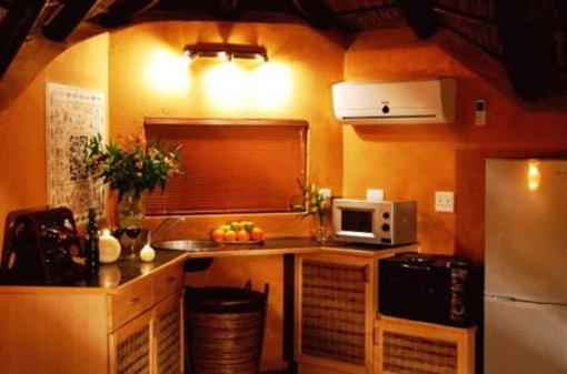 фото отеля Manzini Swazi King Chalets