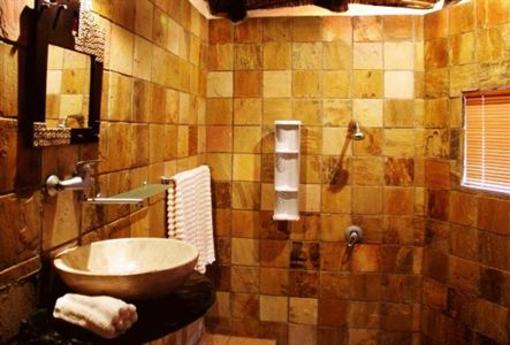 фото отеля Manzini Swazi King Chalets