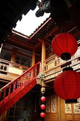 фото отеля Gusuyuan Inn Lijiang