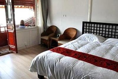 фото отеля Lijiang Free Cloud Guesthouse