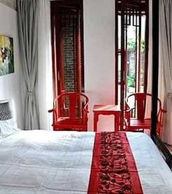 фото отеля Lijiang Free Cloud Guesthouse