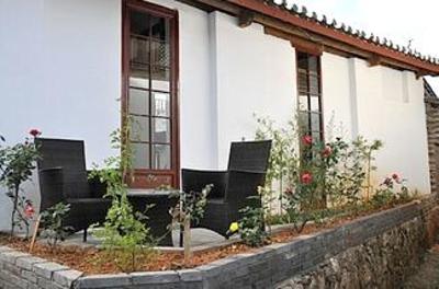 фото отеля Lijiang Free Cloud Guesthouse