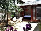 фото отеля Lijiang Free Cloud Guesthouse