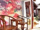 фото отеля Lijiang Free Cloud Guesthouse