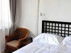 фото отеля Lijiang Free Cloud Guesthouse