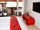 фото отеля Lijiang Free Cloud Guesthouse